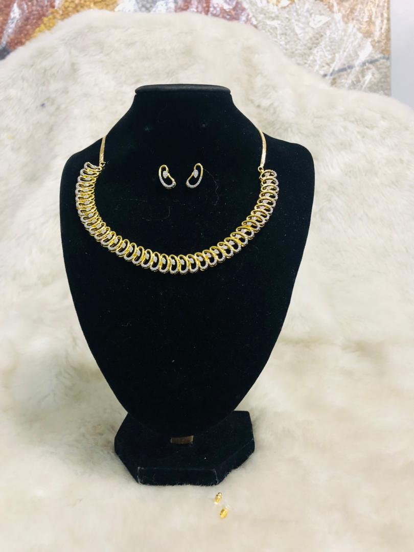 Women Golden Infinity Loop Necklace & Earring Set | RTNS - 287-5